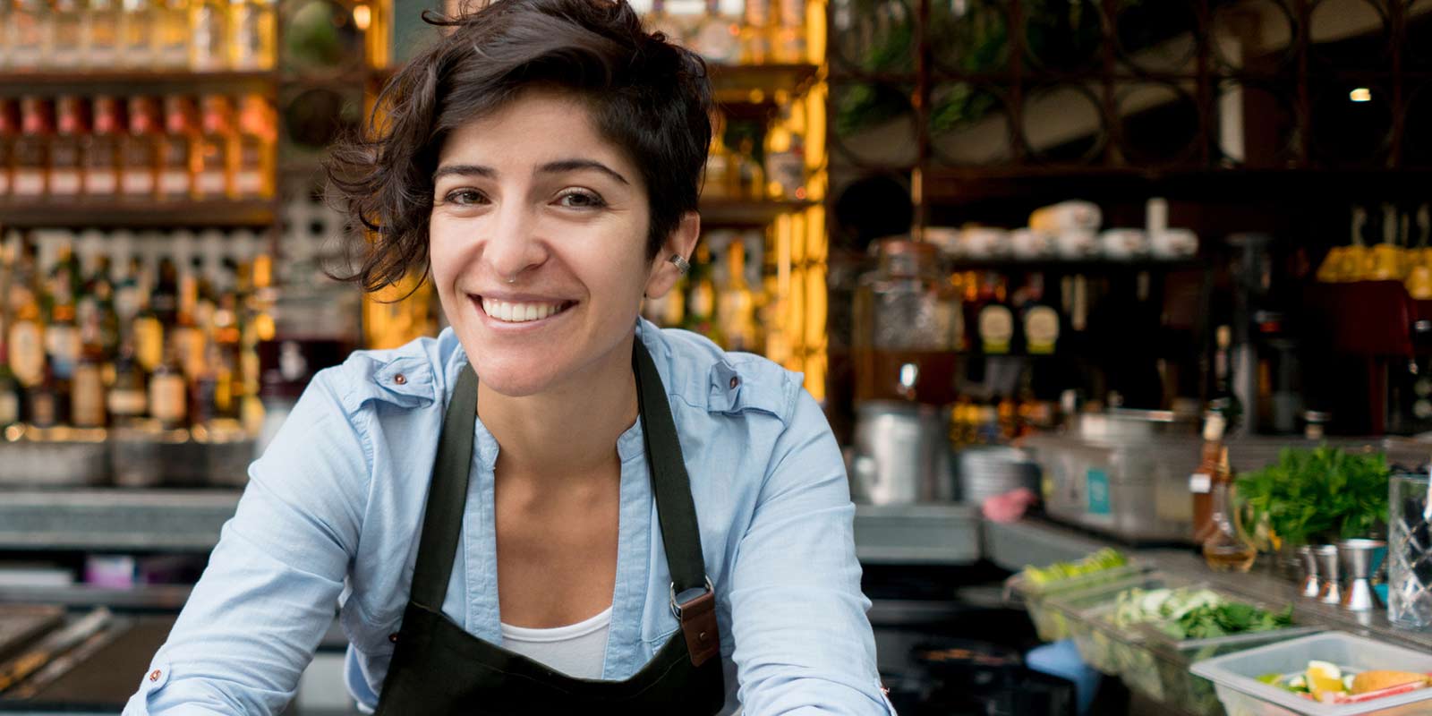 A woman working in a cafe.